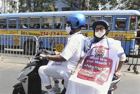 West Bengal Election 2021 Cm Mamata Banerjee Travels On An Electric Scooter In Kolkata Protest