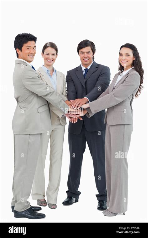 Smiling Business Team Putting Their Hands Together Stock Photo Alamy