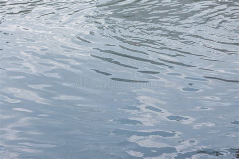 The Surface Of Muddy Water With Small Waves Stock Image Image Of