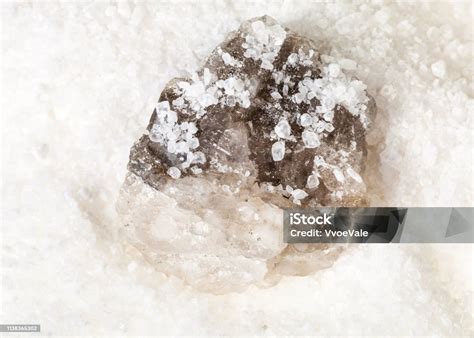 raw halite mineral  grained rock salt close  stock photo