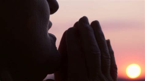 Silhouette Of Elderly Woman Praying At Stock Footage SBV 336748271