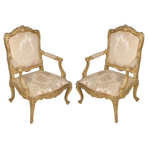 Pair Of French Louis Xvi Style Th Century Giltwood Carved Chairs For