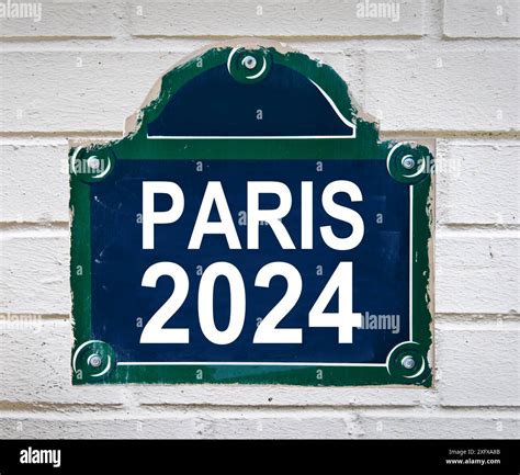 Text PARIS 2024 written on a Parisian classic vintage street metal ...