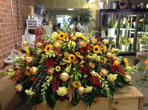 Fall casket piece | Funeral floral, Funeral flowers, Funeral flower ...