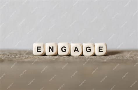 Premium Photo Word Engage Made With Wood Building Blocks