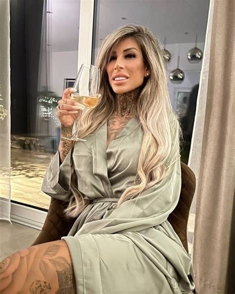 Skinny Inked Amateur Babe Poses In Sexy Tights And Teases With Her Cleavage CoedCherry