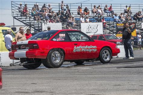 Chevrolet Cavalier Making A Smoke Show On The Track At The Starting