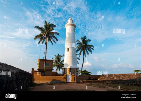 Galle Dutch Fort Lighthouse And Coconut Trees In Sri Lanka Stock Photo