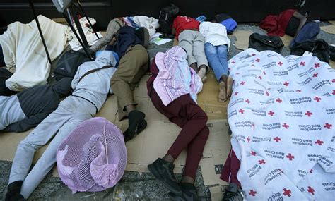 Migrants sleep outside as New York mayor says city is full