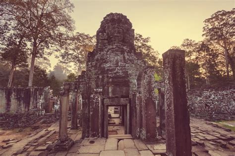 Premium Photo Stone Faces Of Ancient Khmer Culture Temple Of Bayon In