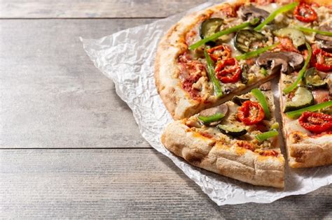 Premium Photo Vegetarian Pizza With Zucchini Tomato Peppers And