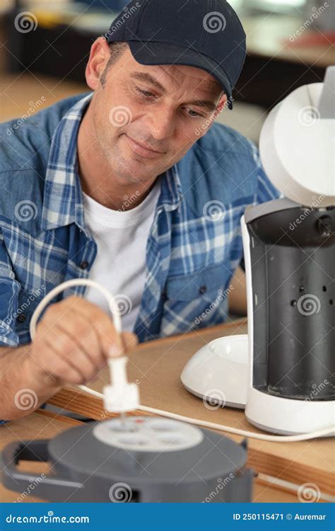 Serious Man Repairing Broken Coffee Machine Stock Image Image Of