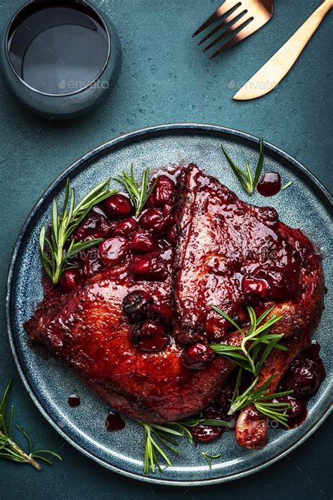 Baked Duck Legs In Cherry And Red Wine Sauce With Rosemary Delicacy