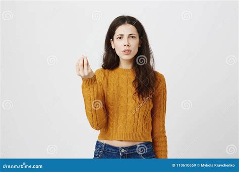 Disappointed Frowning Redhead Woman Pointing Finger Right At Something Bad Scolding Or