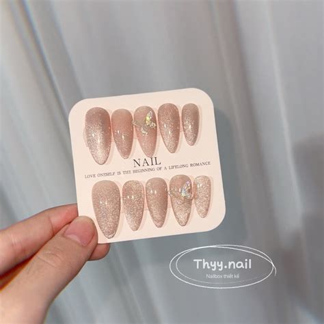 Nailbox thiết kế thạch mắt mèo hồng nude gắn charm xinh Thyy nail