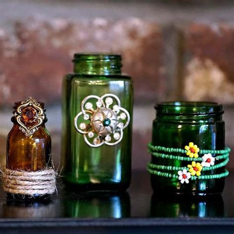 How To Decorate Glass Bottles And Jars With Old Jewelry Diy Bottle Crafts Glass Bottle Diy