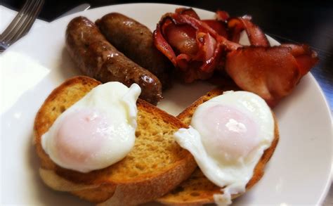 Poached Eggs On Toast With Side Of Bacon And Sausage Flickr