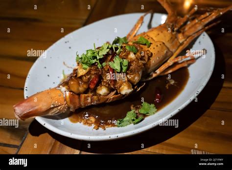 Thai Lobster With Tamarind Sauce And On Top With Corianders Stock Photo