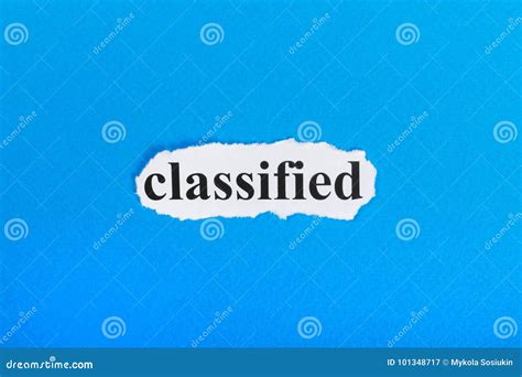 Classified Text On Paper Word Classified On Torn Paper Stock Image