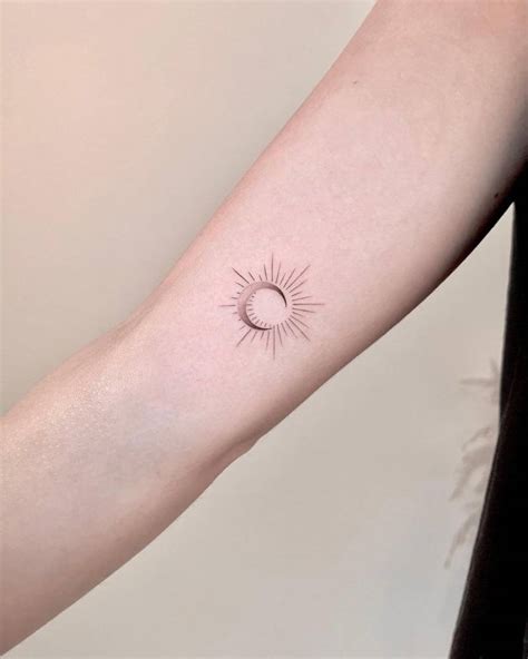 Fine Line Sun And Moon Tattoo On The Inner Arm