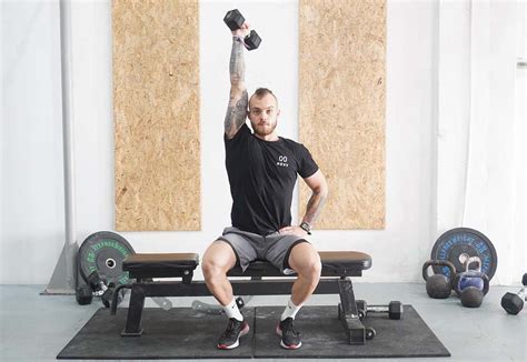 One Arm Seated Dumbbell Extension