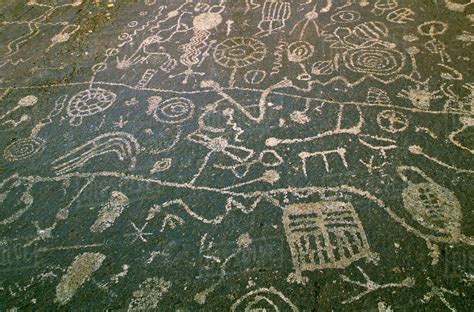 USA, Nevada. Detail of circular petroglyphs at the edge of the Great ...