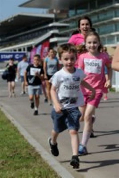 All The Incredible Pictures Of The Cancer Research Race For Life At Cheltenham Racecourse