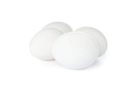 Premium Photo | White chicken eggs isolated on white