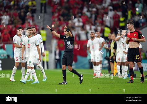 Referee Cesar Arturo Ramos Palazuelos signals to rule out a Morroco ...