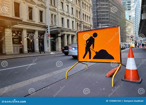 Road Work Ahead Symbol Sign Applying on Busy Business Center Editorial ...