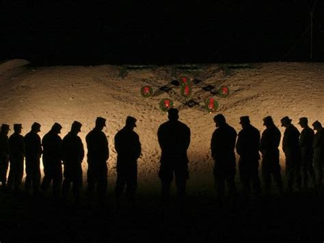 Us Marines Bowing Their Heads In Silence In Honor Of Fallen Comrades