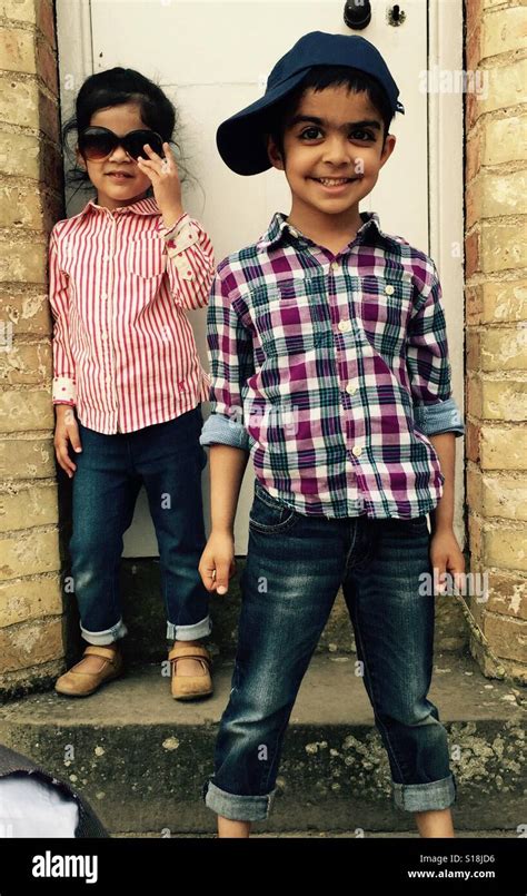 Stylish kids pose for a photo Stock Photo - Alamy