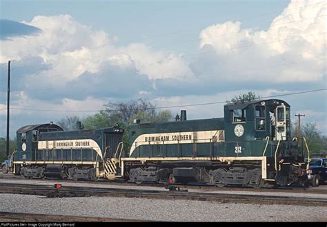 An Old Train Is Parked On The Tracks