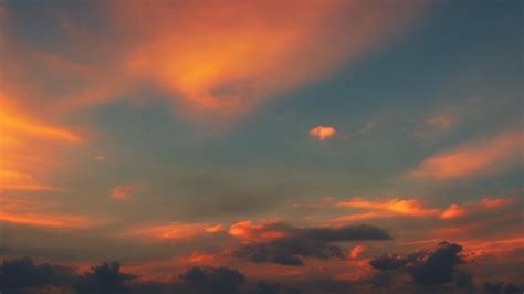 Premium AI Image | A sunset with a cloud in the sky