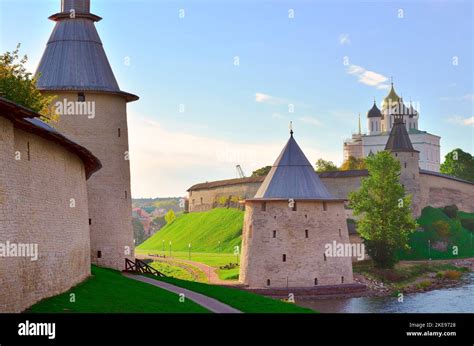 The Old Russian Pskov Kremlin Fortress Walls With Old Towers Of The