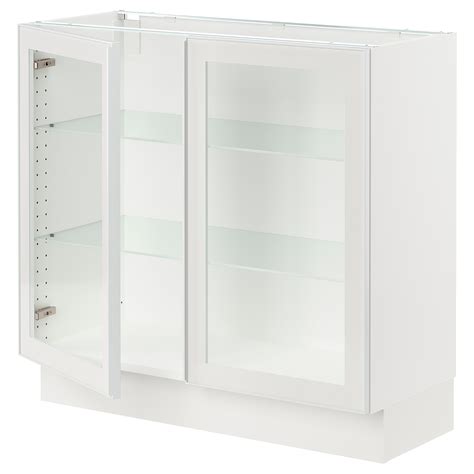 SEKTION base cabinet with 2 glass doors, white/Hejsta white clear glass ...