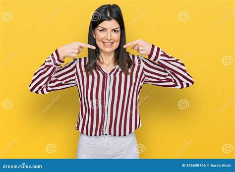 Beautiful Brunette Woman Wearing Striped Shirt Smiling Cheerful Showing