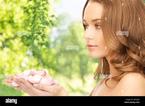 Beautiful Woman With Rose Flower Petals Stock Photo Alamy