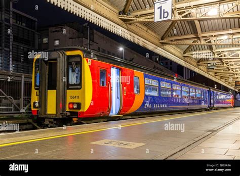 Night Scene Of An East Midlands Railway Class 156 Local Train Seen At Nottingham Railway Station