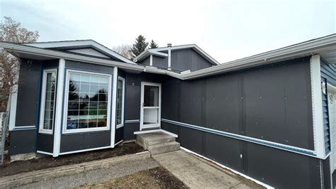 Heritage Blue Vinyl Siding Renovation — Blue Jay Exterior Renovations