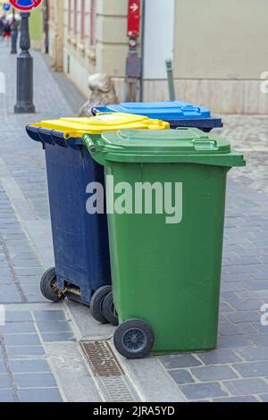 Three Colour Coded Plastic Recycling Bins For Aluminium Drink Cans