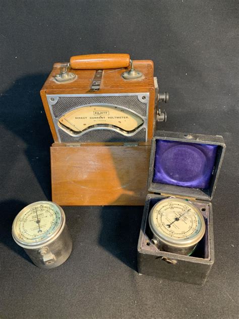 Mahogany Cased Elliott Direct Current Voltmeter And Two Elliott Speed