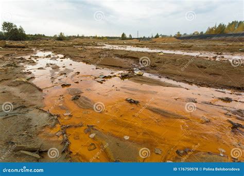 Landscape With Red Soil Polluted Copper Mining Factory In Karabash