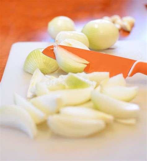 Slicing the onion stock photo. Image of cooking, white - 83416778