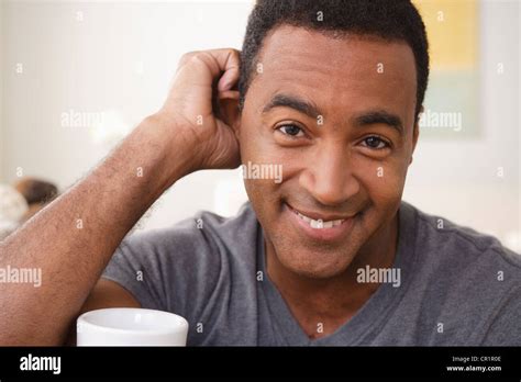 USA California Los Angeles Portrait Of Smiling Mature Man Holding