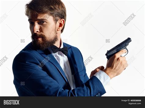 Man Suit Holding Gun Image & Photo (Free Trial) | Bigstock