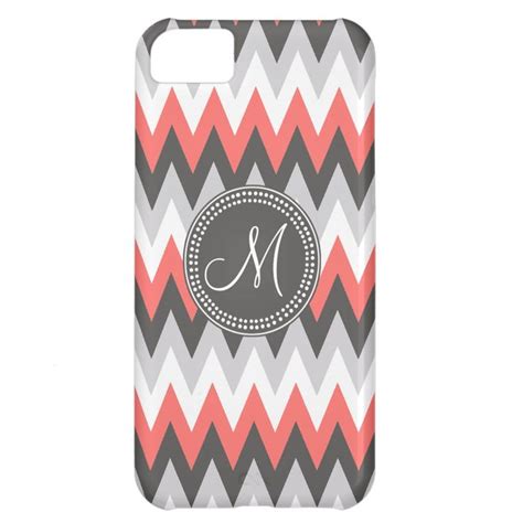 A Monogrammed Iphone Case With An Orange Gray And Black Zigzag Pattern