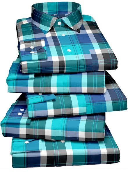 Premium Photo A Stack Of Blue And Green Plaid Shirts With The Word