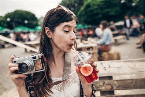 Stylish Hipster Woman In Sunglasses With Red Lips Drinking Lemon Stock