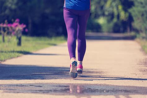 young female runner training for marathon 11930164 Stock Photo at Vecteezy